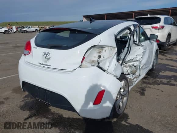2017 Hyundai Veloster with VIN KMHTC6ADXHU318331, listed as a IAAI auction lot 41588356 with 48,282 mi miles and . Bid and sale history available at DreamBid. Image 4.