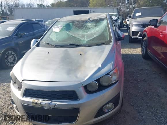 2013 Chevrolet Sonic LTZ with VIN 1G1JE5SG0D4113306, listed as a IAAI auction lot 41897356 with 135,291 mi miles and . Bid and sale history available at DreamBid. Image 12.