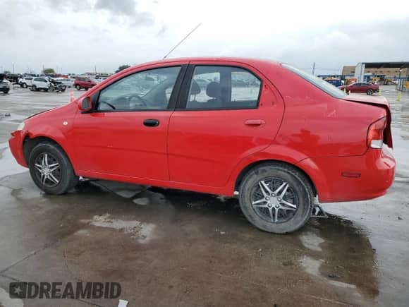2006 Chevrolet Aveo LS with VIN KL1TD56696B599513, listed as a Copart auction lot 77619944 with 210,435 mi miles and Salvage title. Bid and sale history available at DreamBid. Image 2.