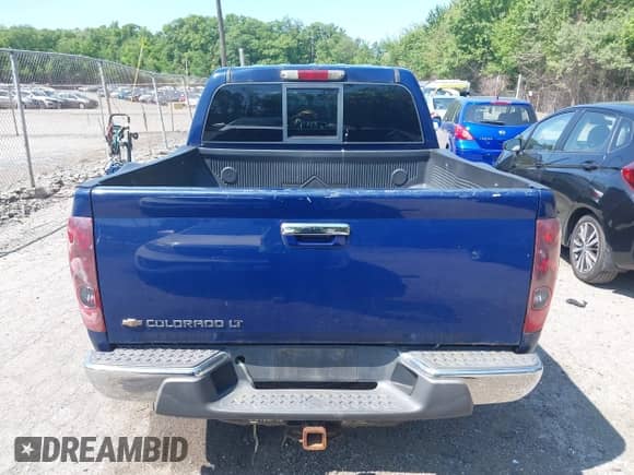 2009 Chevrolet Colorado 2LT with VIN 1GCDT13E798138770, listed as a IAAI auction lot 42409868 with 183,822 mi miles and . Bid and sale history available at DreamBid. Image 16.