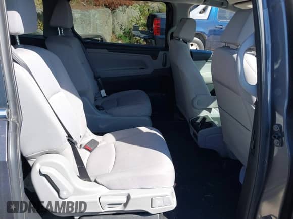 2020 Honda Odyssey LX with VIN 5FNRL6H26LB001361, listed as a IAAI auction lot 43071290 with 77,842 mi miles and . Bid and sale history available at DreamBid. Image 8.