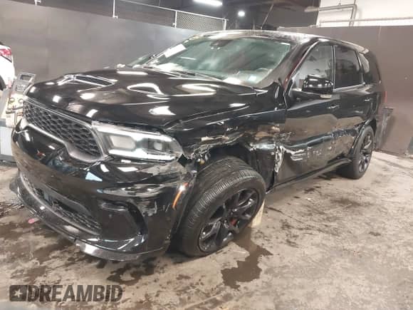2023 Dodge Durango SRT Hellcat with VIN 1C4SDJH98PC585330, listed as a IAAI auction lot 41047195 with 7,744 mi miles and . Bid and sale history available at DreamBid. Image 21.