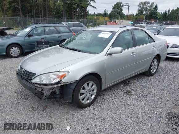 2003 Toyota Camry LE with VIN 4T1BE32K53U786106, listed as a IAAI auction lot 43214509 with 160,136 mi miles and . Bid and sale history available at DreamBid. Image 2.