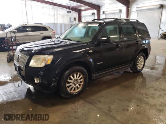 2008 Mercury Mariner Premier with VIN 4M2CU97108KJ09427, listed as a Copart auction lot 85684415 with 138,905 mi miles and Clean title. Bid and sale history available at DreamBid. Image 1.