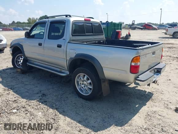 2003 Toyota Tacoma PreRunner z VIN 5TEGN92N53Z205136, wystawiony jako IAAI lot #43092297 z przebiegiem 359 615 mil mil oraz . Historia ofert i sprzedaży dostępna na DreamBid. Obrazek 3.