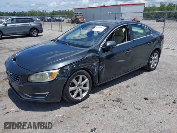 2016 Volvo S60 T5 Drive-E Premier z VIN YV126MFK9G2397028, wystawiony jako IAAI lot #42593825 z przebiegiem 67 080 mil mil oraz . Historia ofert i sprzedaży dostępna na DreamBid. Obrazek 18.