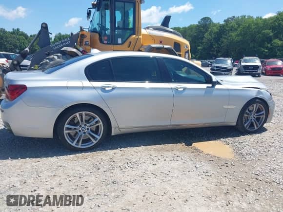 2015 BMW 7 Series 750Li с VIN WBAYE8C5XFD781635, выставлен на аукционе IAAI как лот 42318782 с пробегом 164 487 миль миль и . История ставок и продаж доступна на DreamBid. Изображение 13.