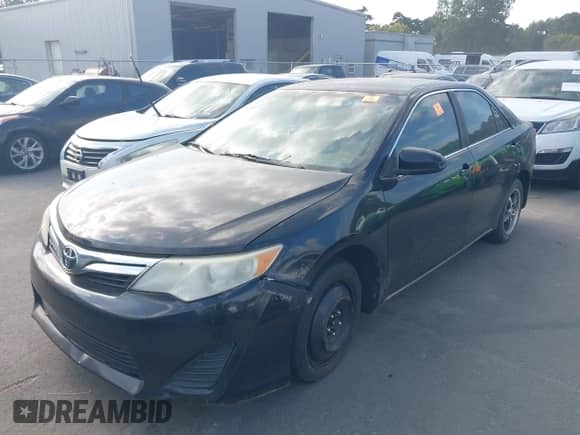 2012 Toyota Camry L with VIN 4T1BF1FK0CU035958, listed as a IAAI auction lot 43177075 with 198,922 mi miles and . Bid and sale history available at DreamBid. Image 20.