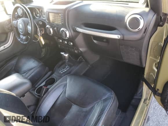 2013 Jeep Wrangler Rubicon with VIN 1C4HJWCG8DL535223, listed as a Copart auction lot 86492615 with 124,963 mi miles and Salvage title. Bid and sale history available at DreamBid. Image 8.