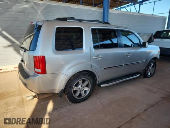 2009 Honda Pilot Touring with VIN 5FNYF48889B042501, listed as a Copart auction lot 82244955 with 187,616 mi miles and Salvage title. Bid and sale history available at DreamBid. Image 3.