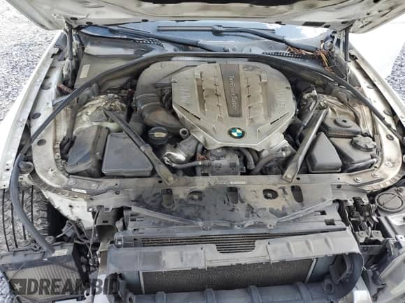 2011 BMW 5 Series 550i с VIN WBAFR9C50BC758334, выставлен на аукционе Copart как лот 66036195 с пробегом 163 691 миль миль и Списание • Salvage title. История ставок и продаж доступна на DreamBid. Изображение 11.