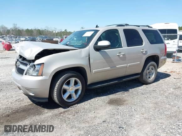 2009 Chevrolet Tahoe 2LT with VIN 1GNFC230X9R214759, listed as a IAAI auction lot 41879645 with 155,344 mi miles and . Bid and sale history available at DreamBid. Image 2.