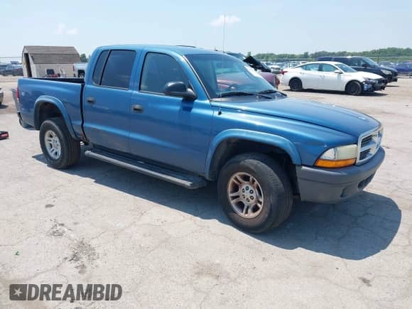 2004 Dodge Dakota Sport z VIN 1D7HG38K74S740201, wystawiony jako IAAI lot #42671044 z przebiegiem 168 620 mil mil oraz . Historia ofert i sprzedaży dostępna na DreamBid. Obrazek 1.