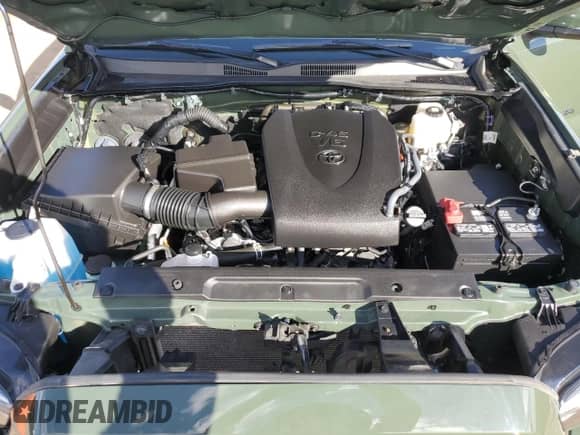 2022 Toyota Tacoma SR с VIN 3TMCZ5AN7NM519528, выставлен на аукционе Copart как лот 84897605 с пробегом 26 429 миль миль и Списание • Salvage title. История ставок и продаж доступна на DreamBid. Изображение 11.