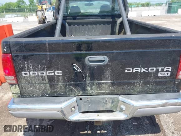 2004 Dodge Dakota SLT with VIN 1D7GL42K64S657235, listed as a IAAI auction lot 42121847 with 157,557 mi miles and . Bid and sale history available at DreamBid. Image 6.