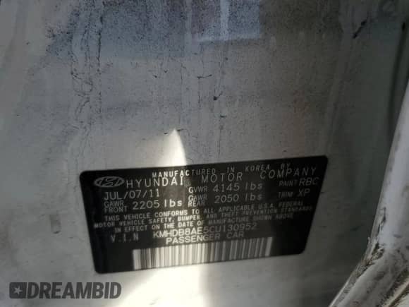 2012 Hyundai Elantra GLS z VIN KMHDB8AE5CU130952, wystawiony jako Copart lot #82003535 z przebiegiem 124 923 mil mil oraz Szkoda całkowita • Salvage title. Historia ofert i sprzedaży dostępna na DreamBid. Obrazek 13.