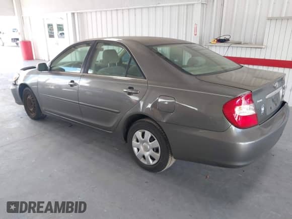 2003 Toyota Camry LE with VIN JTDBE32K630154792, listed as a IAAI auction lot 43294042 with 123,134 mi miles and . Bid and sale history available at DreamBid. Image 3.