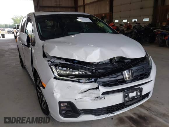 2025 Honda Odyssey EX-L with VIN 5FNRL6H66SB071749, listed as a IAAI auction lot 42712970 with 888 mi miles and . Bid and sale history available at DreamBid. Image 6.