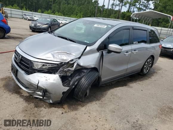 2021 Honda Odyssey EX-L with VIN 5FNRL6H74MB011108, listed as a Copart auction lot 70639845 with 154,827 mi miles and Salvage title. Bid and sale history available at DreamBid. Image 1.