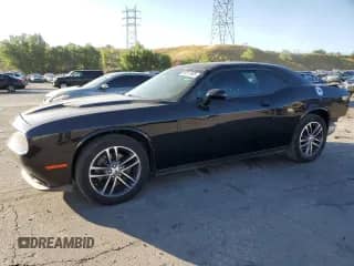 2019 Dodge Challenger SXT with VIN 2C3CDZGG8KH741735, listed as a Copart auction lot 68011665 with 60,526 mi miles and Salvage title. Bid and sale history available at DreamBid. Image 1.