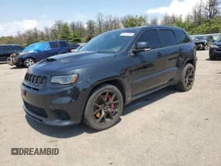 2014 Jeep Grand Cherokee SRT-8 z VIN 1C4RJFDJ0EC171394, wystawiony jako Copart lot #57132295 z przebiegiem 198 657 mil mil oraz Szkoda całkowita • Salvage title. Historia ofert i sprzedaży dostępna na DreamBid. Obrazek 1.