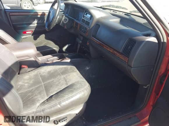 1997 Jeep Grand Cherokee Limited с VIN 1J4GZ78Y3VC614614, выставлен на аукционе IAAI как лот 43011679 с пробегом 203 473 миль миль и . История ставок и продаж доступна на DreamBid. Изображение 5.