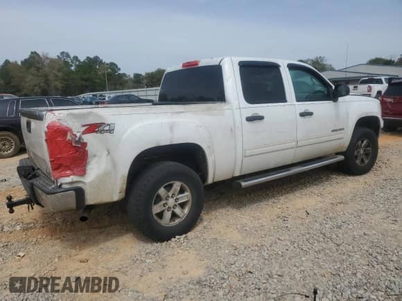 2012 GMC Sierra 1500 SLE with VIN 3GTP2VE72CG145309, listed as a Copart auction lot 50264145 with 141,933 mi miles and Salvage title. Bid and sale history available at DreamBid. Image 3.