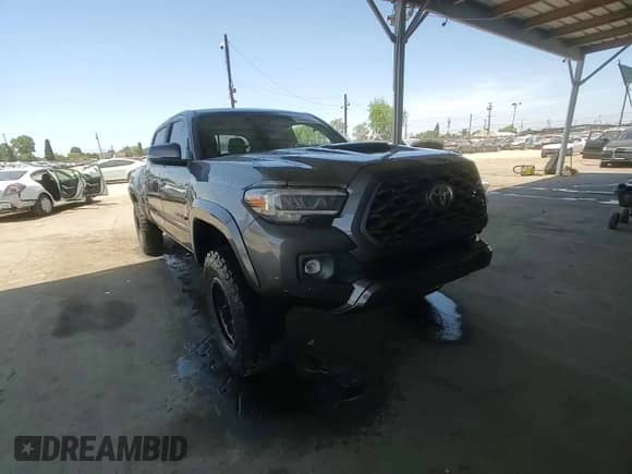 2020 Toyota Tacoma SR5 с VIN 3TMBZ5DN4LM024014, выставлен на аукционе Copart как лот 58260065 с пробегом 145 836 миль миль и Списание • Salvage title. История ставок и продаж доступна на DreamBid. Изображение 13.