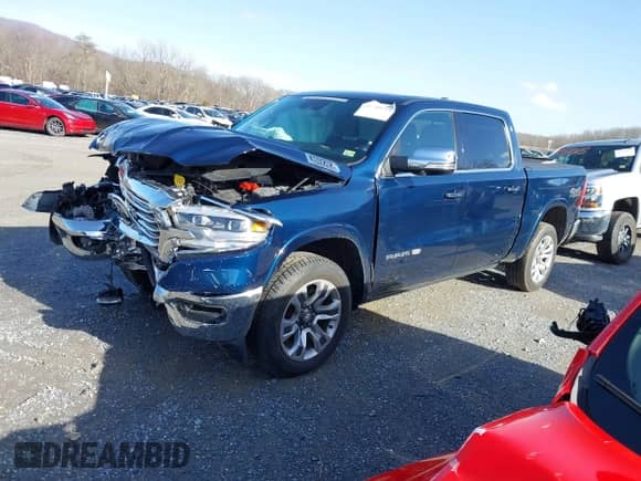 2020 Ram 1500 Longhorn with VIN 1C6SRFKT5LN185329, listed as a IAAI auction lot 41709711 with 78,586 mi miles and . Bid and sale history available at DreamBid. Image 22.