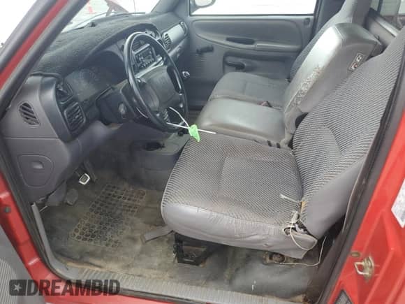 2001 Dodge 1500 Work Special z VIN 1B7HC16X51S218946, wystawiony jako Copart lot #65726535 z przebiegiem 272 045 mil mil oraz Szkoda całkowita • Salvage title. Historia ofert i sprzedaży dostępna na DreamBid. Obrazek 7.