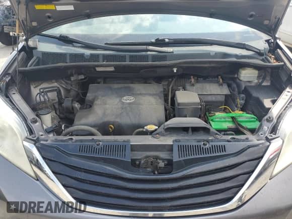 2014 Toyota Sienna LE z VIN 5TDJK3DC8ES093259, wystawiony jako Copart lot #63792635 z przebiegiem 226 271 mil mil oraz Szkoda całkowita • Salvage title. Historia ofert i sprzedaży dostępna na DreamBid. Obrazek 12.