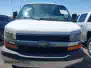 2015 Chevrolet Express Passenger LT with VIN 1GAZG1FG1F1111830, listed as a IAAI auction lot 42860261 with 99,750 mi miles and . Bid and sale history available at DreamBid. Image 12.