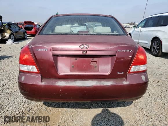 2001 Hyundai Elantra GLS с VIN KMHDN45D91U056045, выставлен на аукционе Copart как лот 68411415 с пробегом 148 691 миль миль и Списание • Salvage title. История ставок и продаж доступна на DreamBid. Изображение 6.