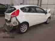 2012 Ford Fiesta SE with VIN 3FADP4EJ8CM180163, listed as a IAAI auction lot 42853102 with Not provided miles and . Bid and sale history available at DreamBid. Image 4.