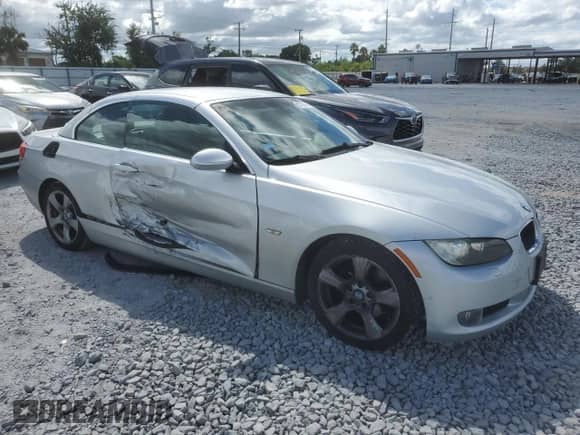 2009 BMW 3 Series 328i with VIN WBAWR33599P460929, listed as a Copart auction lot 84867615 with 123,688 mi miles and Salvage title. Bid and sale history available at DreamBid. Image 4.