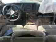 2002 Chevrolet Silverado 1500 с VIN 2GCEC19W221270591, выставлен на аукционе Copart как лот 59389705 с пробегом 313 991 миль миль и Списание • Salvage title. История ставок и продаж доступна на DreamBid. Изображение 8.