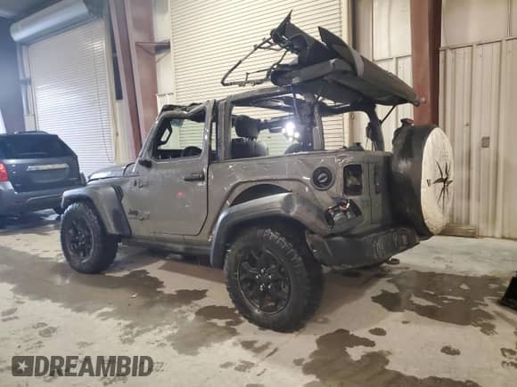 2022 Jeep Wrangler Willys with VIN 1C4GJXAN6NW223825, listed as a Copart auction lot 80460804 with 32,996 mi miles and Salvage title. Bid and sale history available at DreamBid. Image 2.