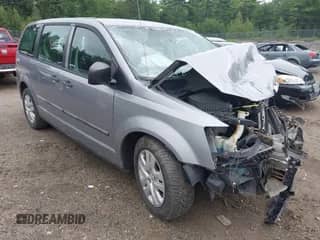 2014 Dodge Grand Caravan SE with VIN 2C4RDGBG4ER166131, listed as a IAAI auction lot 43047117 with 104,454 mi miles and . Bid and sale history available at DreamBid. Image 1.