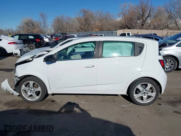 2013 Chevrolet Sonic LTZ with VIN 1G1JE6SH7D4139965, listed as a IAAI auction lot 41288598 with 136,528 mi miles and . Bid and sale history available at DreamBid. Image 14.