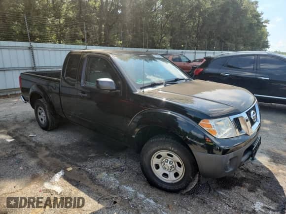 2013 Nissan Frontier S with VIN 1N6BD0CT9DN739652, listed as a Copart auction lot 71299545 with 104,340 mi miles and Salvage title. Bid and sale history available at DreamBid. Image 4.