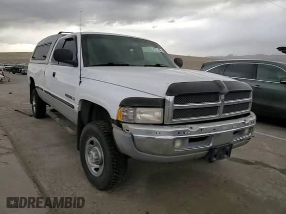 1998 Dodge 2500 z VIN 1B7KF23W1WJ244472, wystawiony jako Copart lot #47412345 z przebiegiem 186 135 mil mil oraz Szkoda całkowita • Salvage title. Historia ofert i sprzedaży dostępna na DreamBid. Obrazek 11.