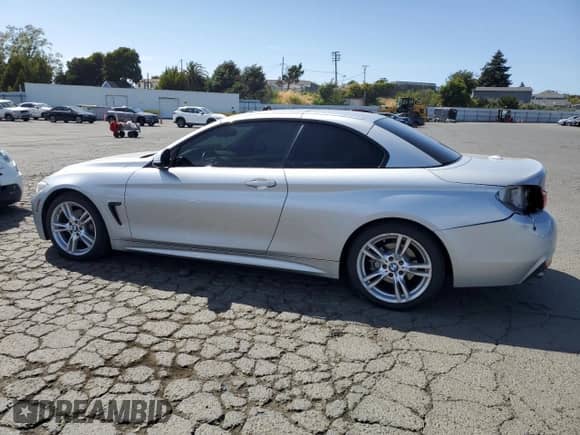 2015 BMW 4 Series 428i with VIN WBA3V7C5XF5A24641, listed as a Copart auction lot 61195125 with 60,499 mi miles and Salvage title. Bid and sale history available at DreamBid. Image 2.