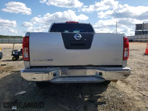 2007 Nissan Frontier XE with VIN 1N6BD06T97C405875, listed as a Copart auction lot 80845995 with 242,895 mi miles and Salvage title. Bid and sale history available at DreamBid. Image 6.