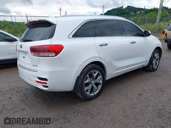 2016 Kia Sorento SXL z VIN 5XYPKDA57GG174551, wystawiony jako IAAI lot #42314487 z przebiegiem 86 606 mil mil oraz . Historia ofert i sprzedaży dostępna na DreamBid. Obrazek 4.