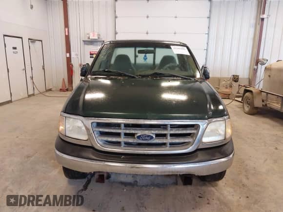 2002 Ford F-150 XL с VIN 2FTRF17W42CA68335, выставлен на аукционе IAAI как лот 42307601 с пробегом 184 138 миль миль и . История ставок и продаж доступна на DreamBid. Изображение 6.