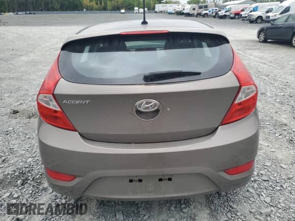 2014 Hyundai Accent GS z VIN KMHCT5AE3EU154502, wystawiony jako Copart lot #68531815 z przebiegiem 296 101 mil mil oraz Nie do naprawy • Non repairable. Historia ofert i sprzedaży dostępna na DreamBid. Obrazek 6.