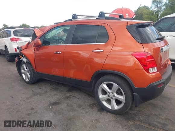 2015 Chevrolet Trax LTZ z VIN KL7CJTSB4FB197257, wystawiony jako IAAI lot #43051496 z przebiegiem Nie podano mil oraz . Historia ofert i sprzedaży dostępna na DreamBid. Obrazek 3.