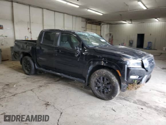 2023 Nissan Frontier SV with VIN 1N6ED1EKXPN616650, listed as a Copart auction lot 84293605 with 31,888 mi miles and Salvage title. Bid and sale history available at DreamBid. Image 4.