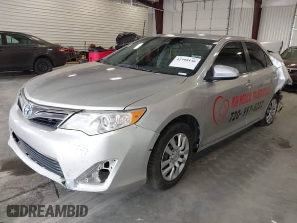 2013 Toyota Camry LE z VIN 4T1BD1FK8DU064728, wystawiony jako IAAI lot #42398146 z przebiegiem 100 867 mil mil oraz . Historia ofert i sprzedaży dostępna na DreamBid. Obrazek 2.