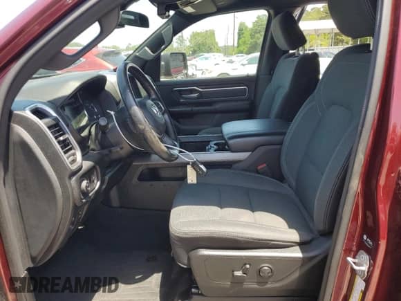 2022 Ram 1500 Lone Star with VIN 1C6RREFT0NN228044, listed as a Copart auction lot 57101745 with 25,480 mi miles and Salvage title. Bid and sale history available at DreamBid. Image 7.